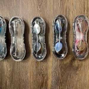 Brand new. Swimming goggles with case